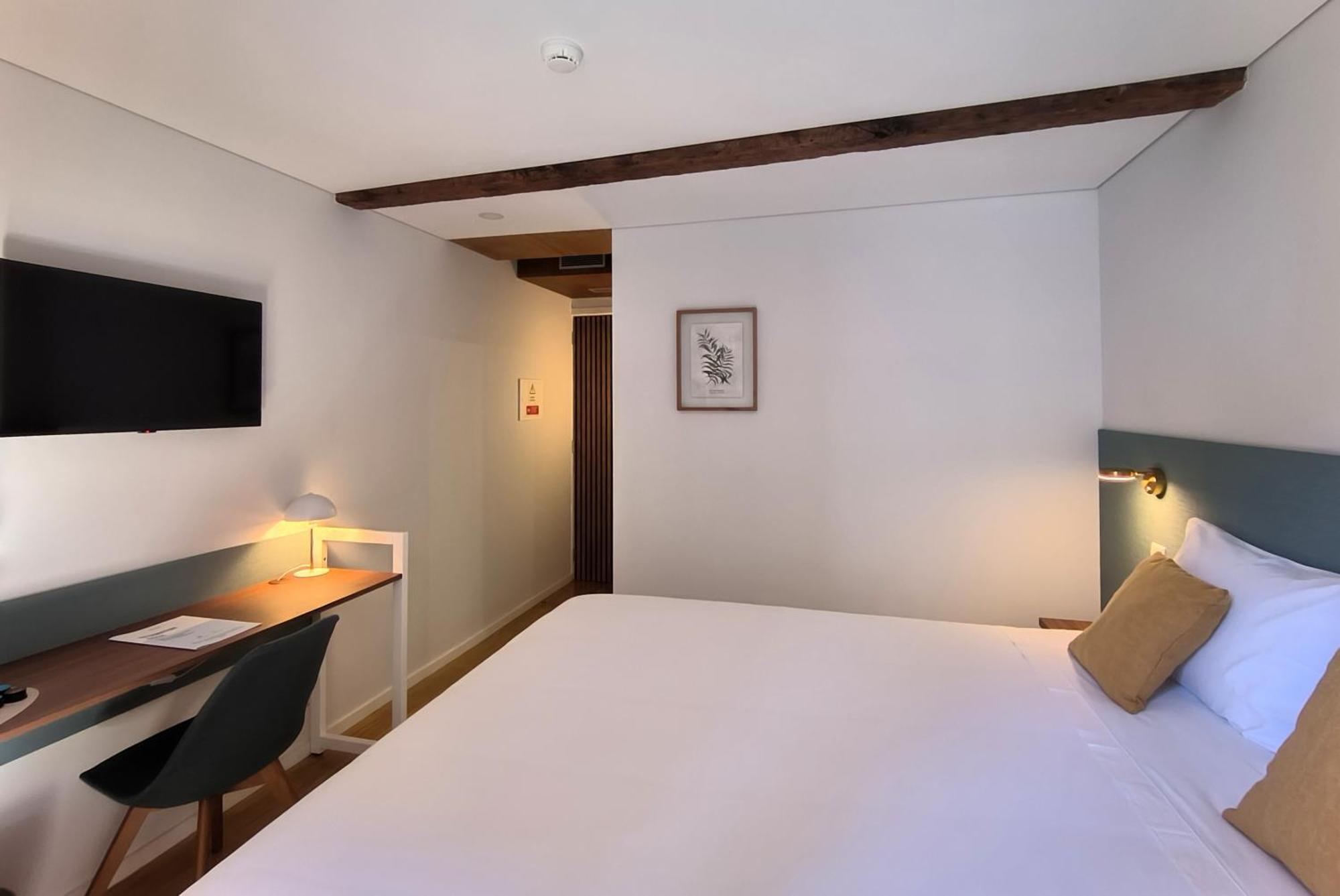 Domi Suites & Studios Гимарайнш Экстерьер фото